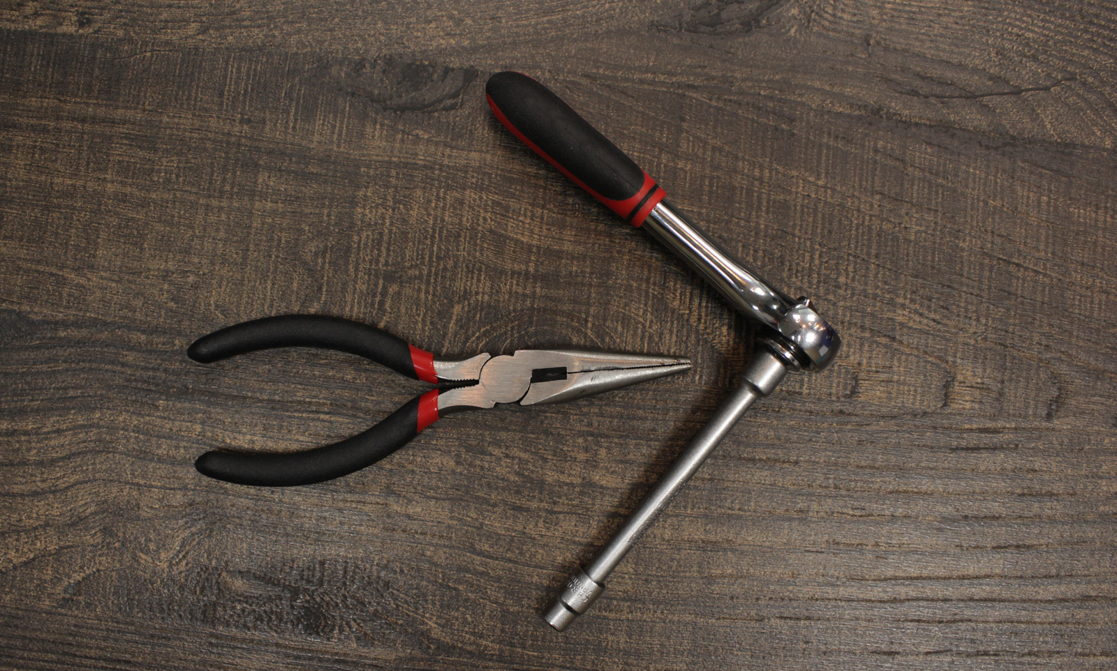 Pliers and socket wrench